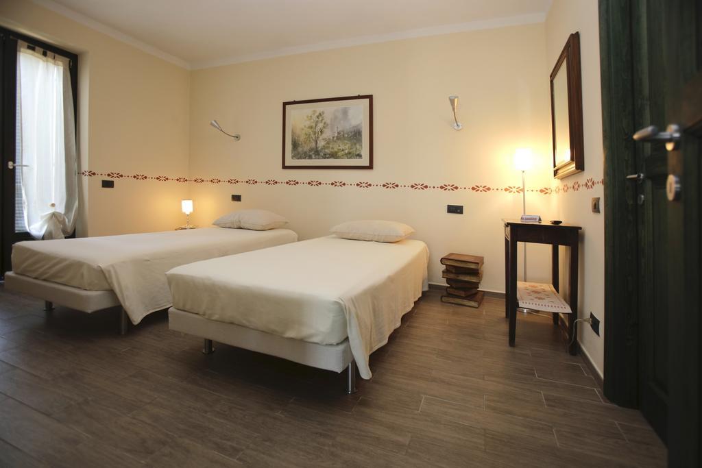 Ospitidelpero Bed & Breakfast Piozzo Ruang foto